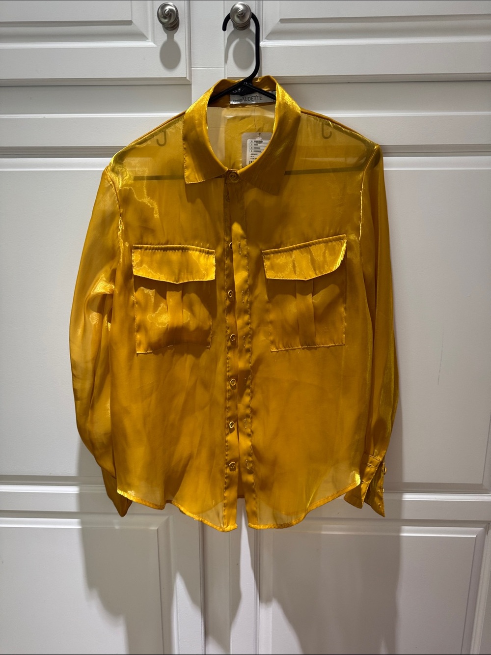 Anthropology’s Sheer Button-Down Shirt in Mustard Yellow